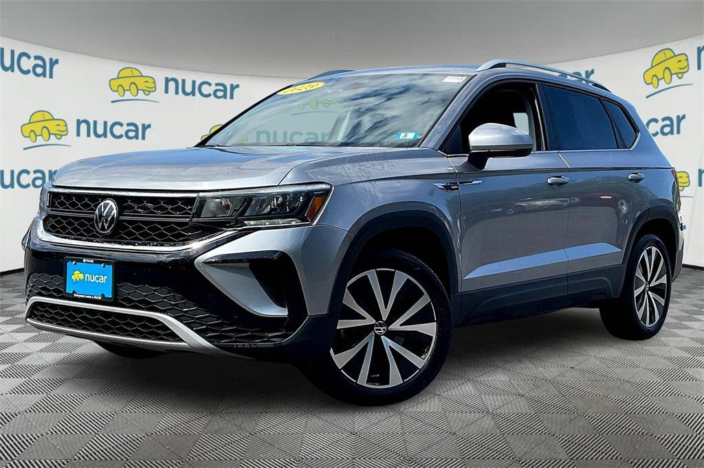 used 2023 Volkswagen Taos car, priced at $19,998