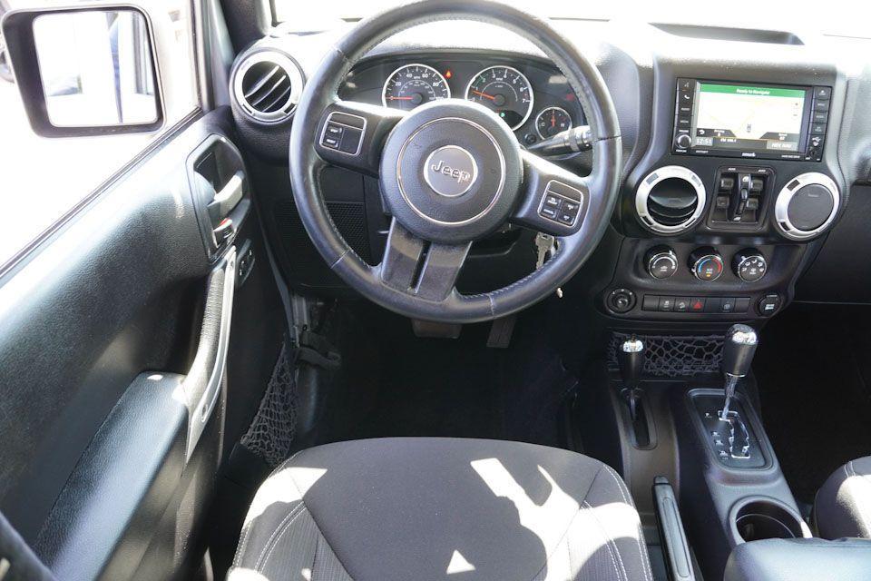 used 2015 Jeep Wrangler Unlimited car, priced at $22,996