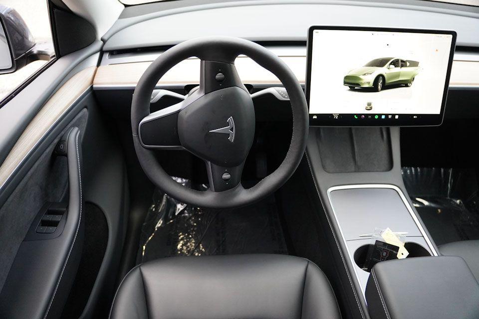 used 2023 Tesla Model Y car, priced at $33,499