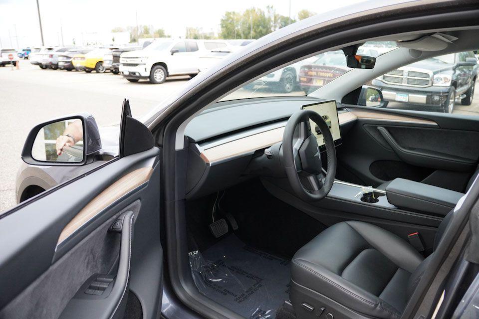 used 2023 Tesla Model Y car, priced at $33,499