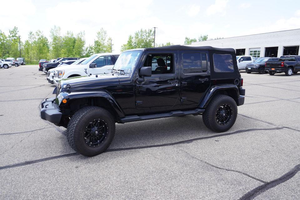 used 2014 Jeep Wrangler Unlimited car, priced at $23,856