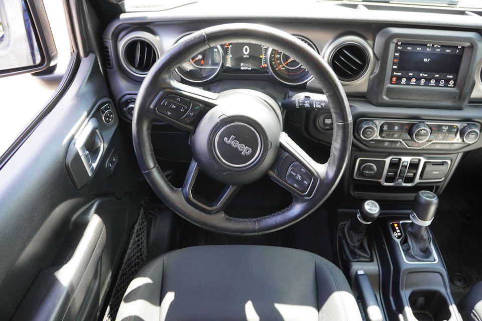 used 2021 Jeep Wrangler Unlimited car, priced at $31,571