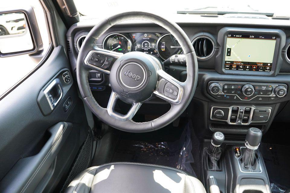 used 2023 Jeep Wrangler 4xe car, priced at $33,933