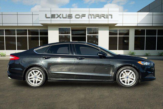 used 2015 Ford Fusion car, priced at $5,996