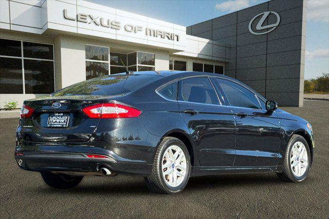 used 2015 Ford Fusion car, priced at $5,996