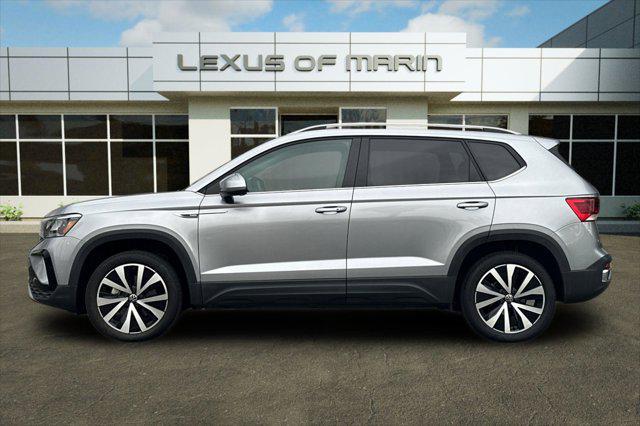 used 2023 Volkswagen Taos car, priced at $21,497