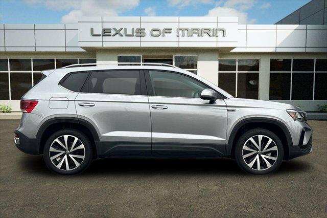 used 2023 Volkswagen Taos car, priced at $21,497