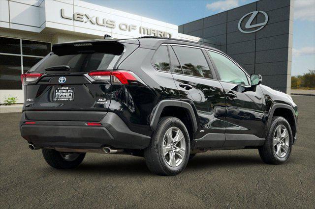 used 2024 Toyota RAV4 Hybrid car, priced at $31,999