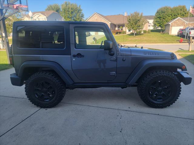 used 2014 Jeep Wrangler car, priced at $16,995