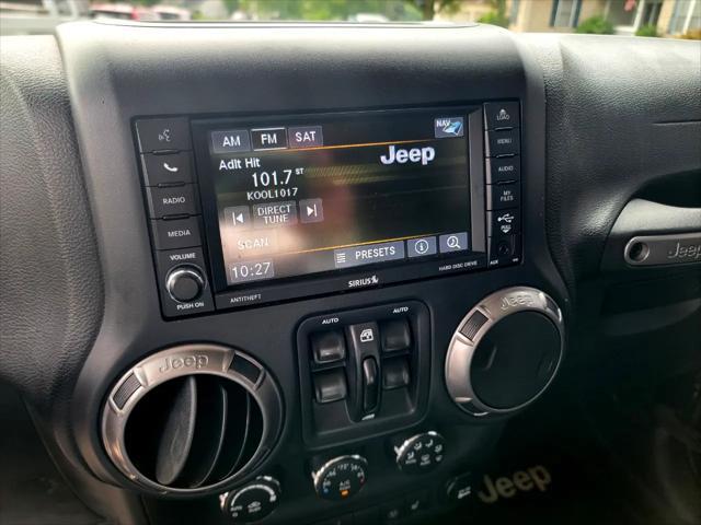 used 2018 Jeep Wrangler JK Unlimited car, priced at $21,995