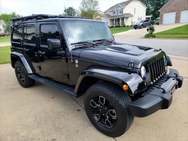 used 2018 Jeep Wrangler JK Unlimited car, priced at $21,995