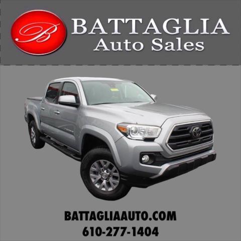 used 2019 Toyota Tacoma car, priced at $29,243