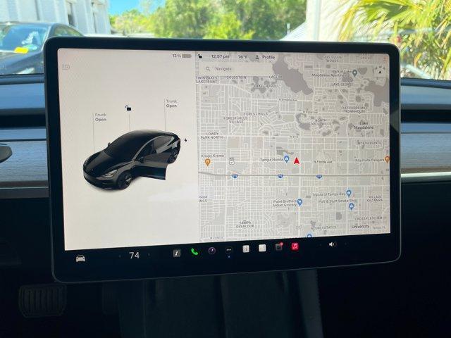 used 2023 Tesla Model 3 car, priced at $27,588