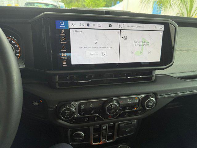 used 2025 Jeep Wrangler car, priced at $40,202