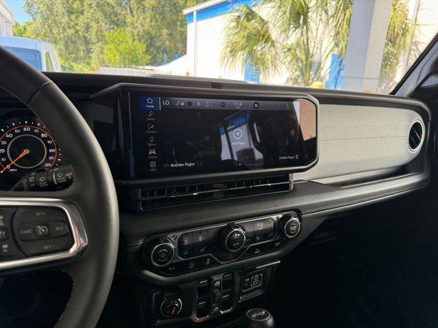 used 2025 Jeep Wrangler car, priced at $39,873