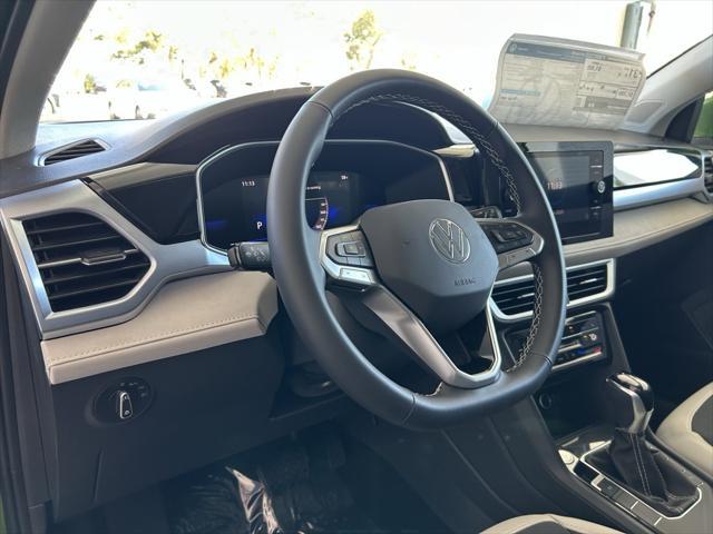 new 2025 Volkswagen Taos car, priced at $30,082