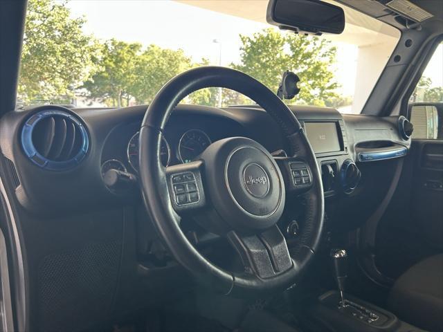 used 2018 Jeep Wrangler JK Unlimited car, priced at $23,821
