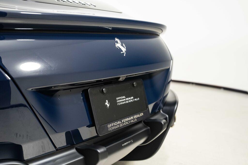 used 2024 Ferrari Roma Spider car, priced at $305,000
