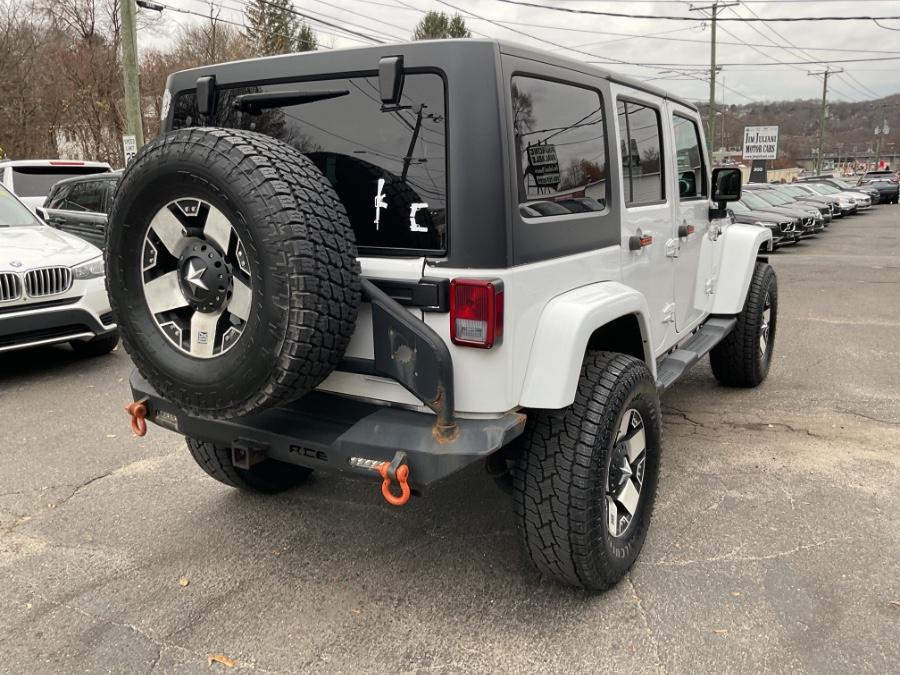 used 2013 Jeep Wrangler Unlimited car, priced at $17,890