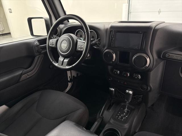 used 2015 Jeep Wrangler car, priced at $17,945