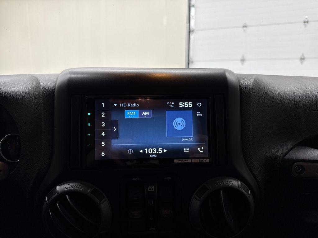 used 2016 Jeep Wrangler Unlimited car, priced at $18,936