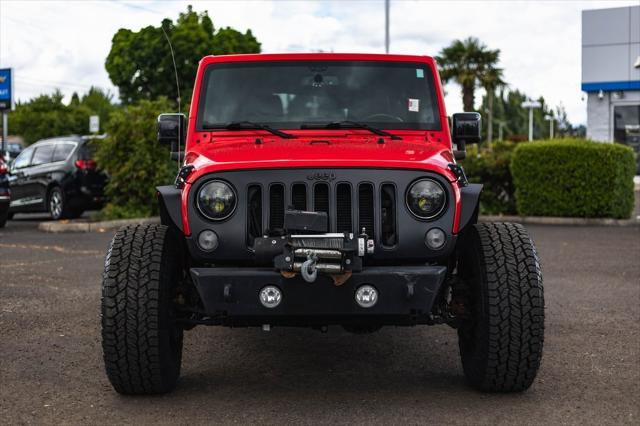 used 2014 Jeep Wrangler Unlimited car, priced at $19,999