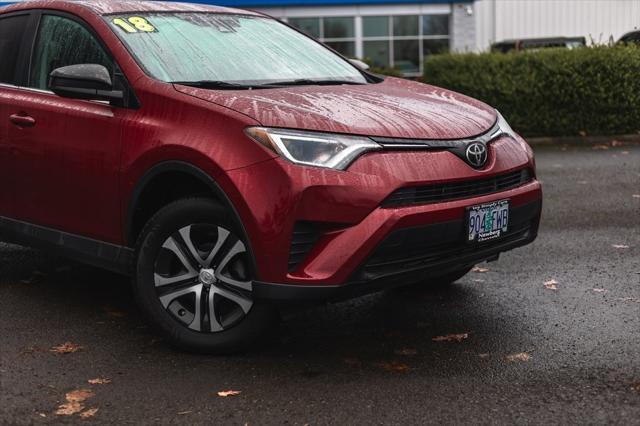 used 2018 Toyota RAV4 car, priced at $19,577