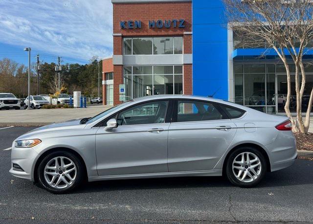 used 2016 Ford Fusion car, priced at $11,889