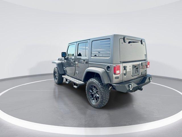 used 2018 Jeep Wrangler JK Unlimited car, priced at $17,900