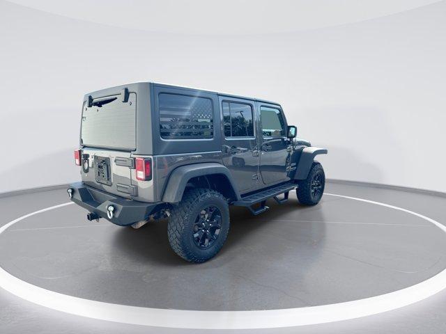 used 2018 Jeep Wrangler JK Unlimited car, priced at $17,900