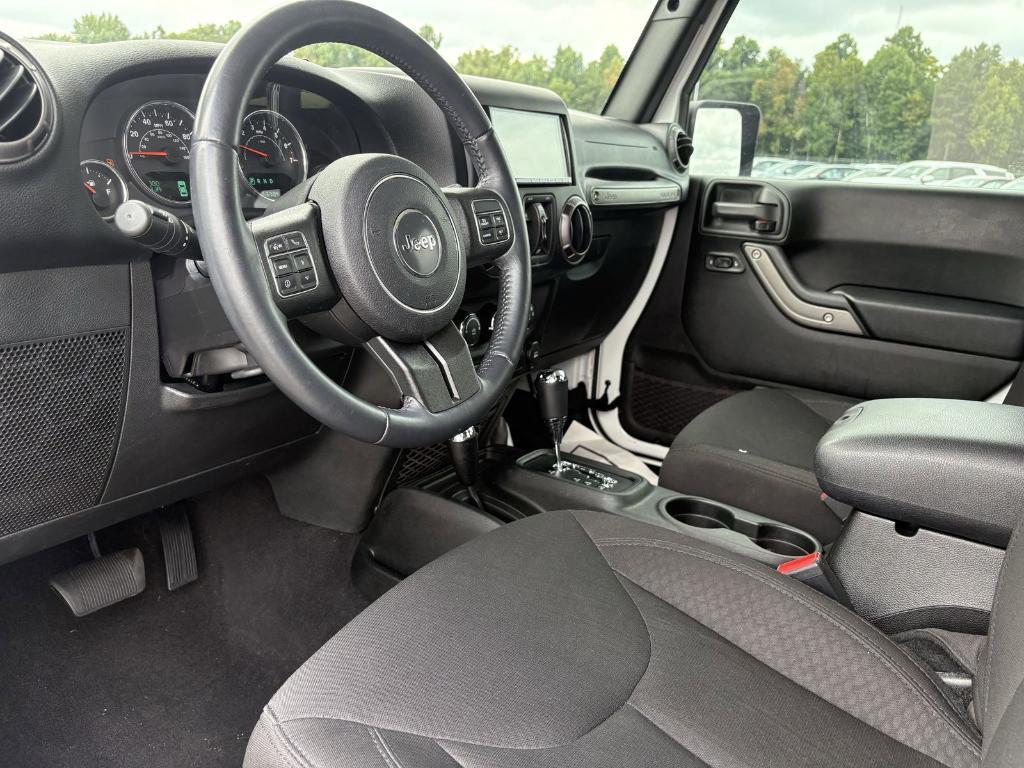 used 2023 Jeep Wrangler car, priced at $34,900