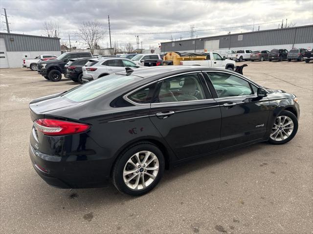 used 2019 Ford Fusion Hybrid car, priced at $14,143