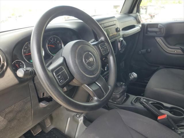 used 2016 Jeep Wrangler car, priced at $15,000