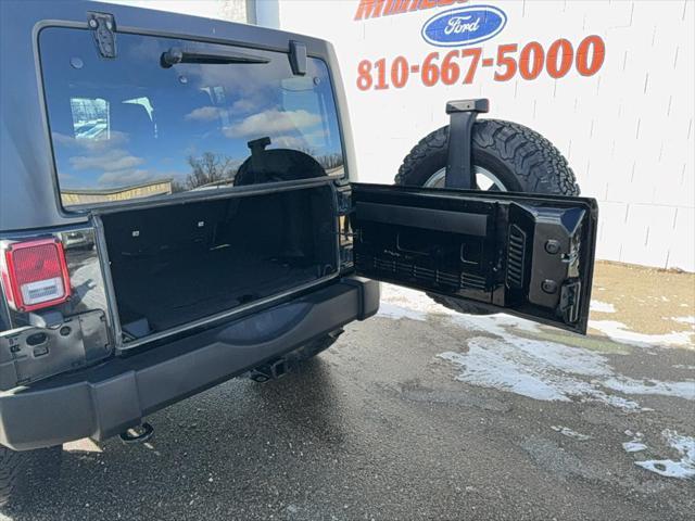 used 2018 Jeep Wrangler JK Unlimited car, priced at $19,597