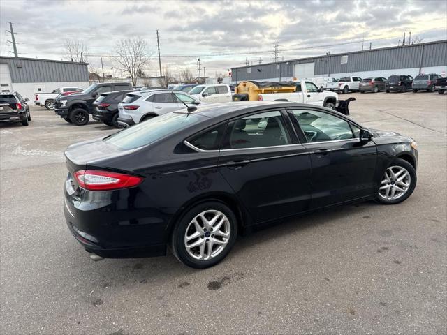 used 2016 Ford Fusion car, priced at $6,997