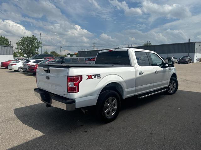 used 2019 Ford F-150 car, priced at $26,234