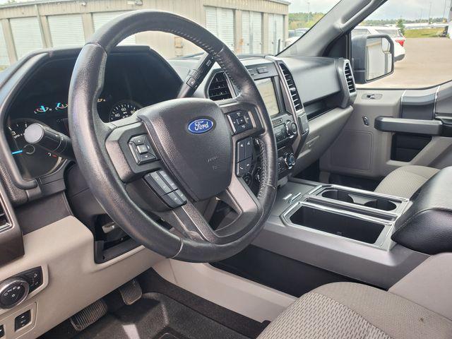 used 2018 Ford F-150 car, priced at $23,643
