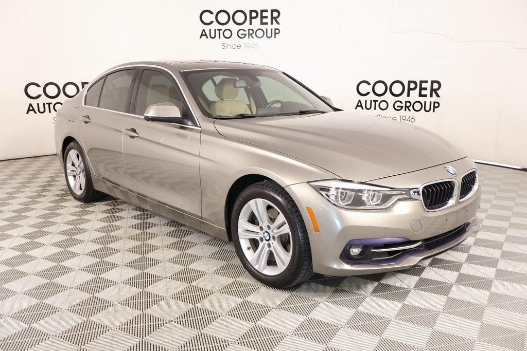 used 2018 BMW 330 car, priced at $16,854