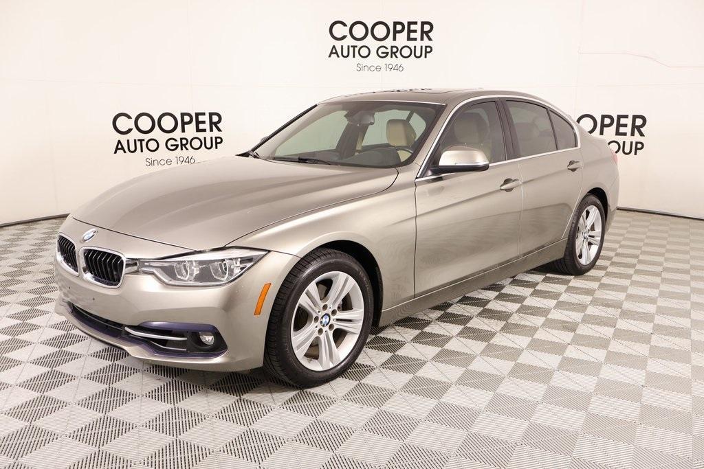 used 2018 BMW 330 car, priced at $16,854