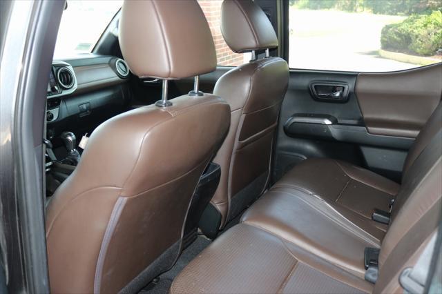 used 2016 Toyota Tacoma car, priced at $15,573