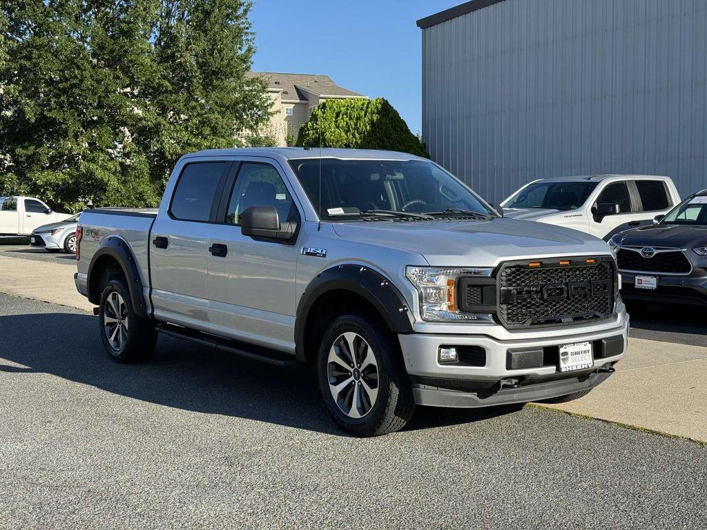 used 2019 Ford F-150 car, priced at $29,124
