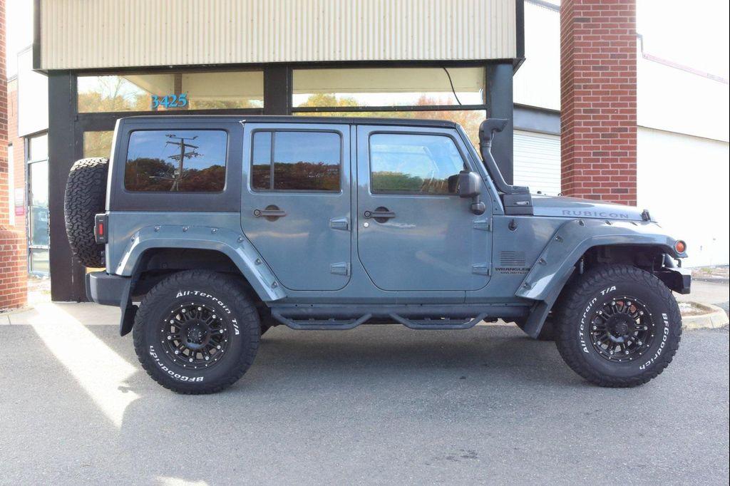 used 2014 Jeep Wrangler Unlimited car, priced at $18,988