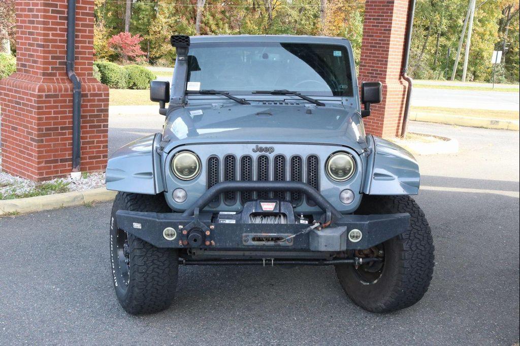 used 2014 Jeep Wrangler Unlimited car, priced at $18,988