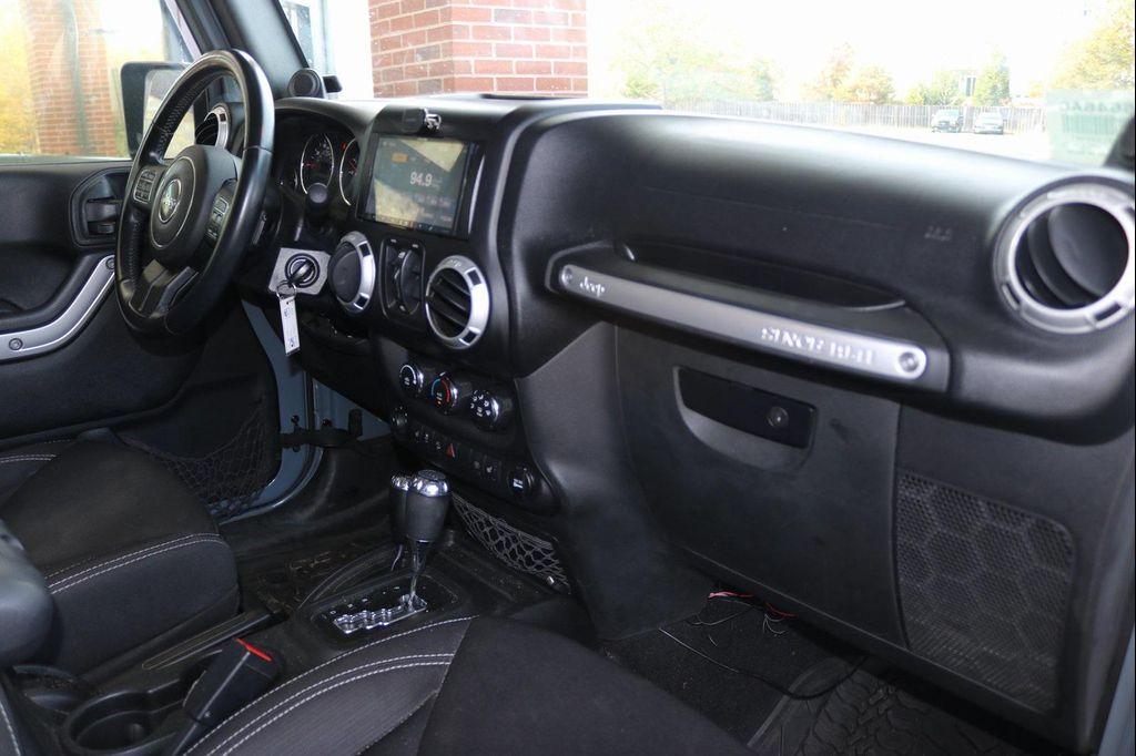 used 2014 Jeep Wrangler Unlimited car, priced at $18,988