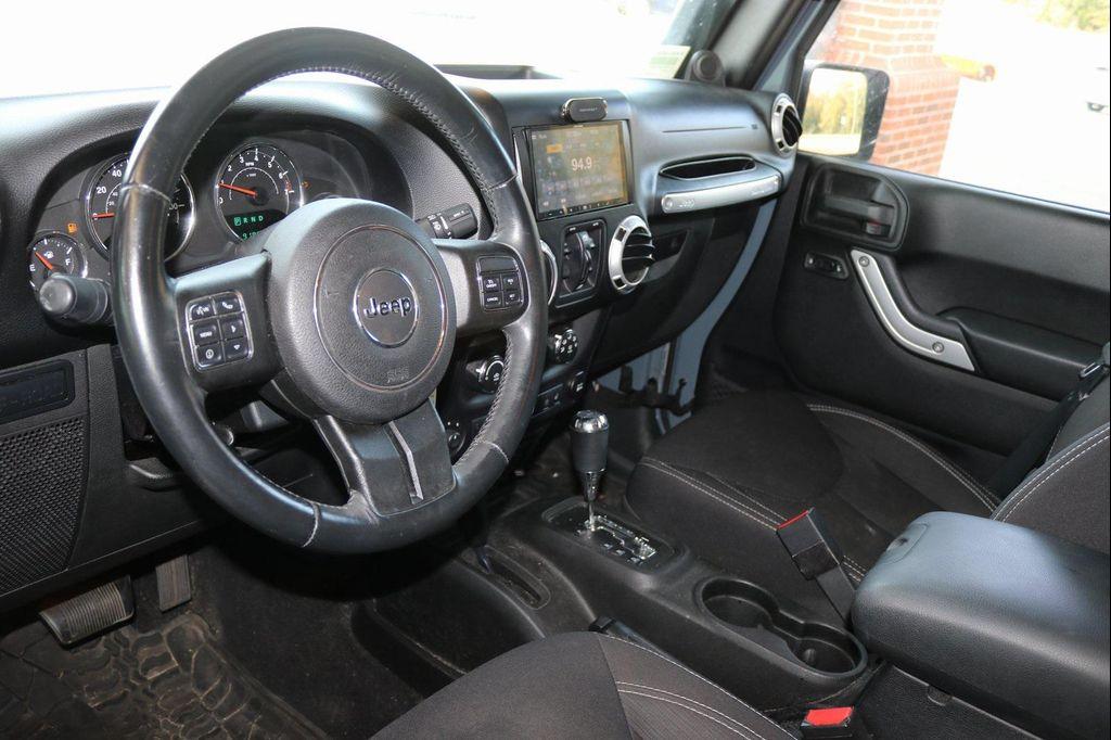 used 2014 Jeep Wrangler Unlimited car, priced at $18,988