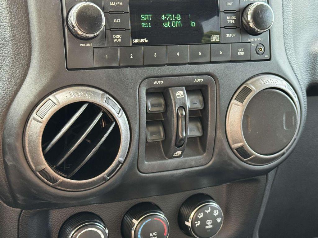 used 2018 Jeep Wrangler JK Unlimited car, priced at $23,352