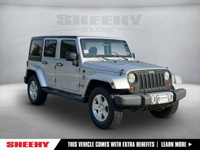 used 2011 Jeep Wrangler Unlimited car, priced at $13,388