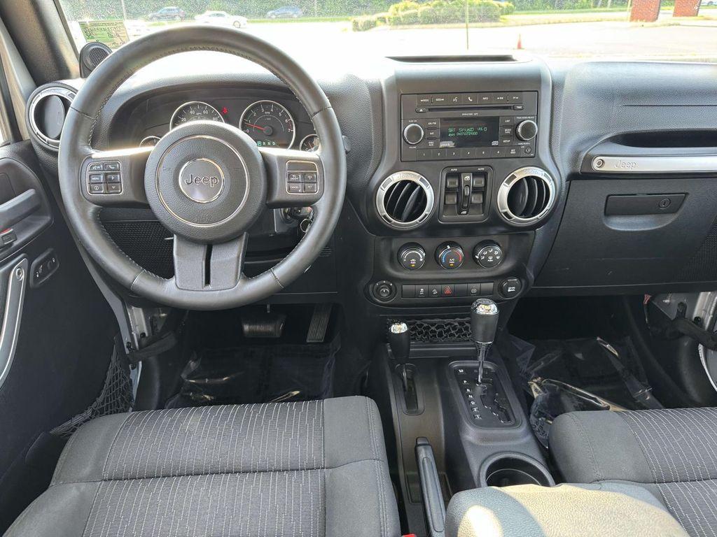 used 2011 Jeep Wrangler Unlimited car, priced at $13,362
