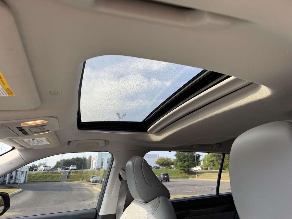 used 2022 Toyota Highlander Hybrid car, priced at $35,300