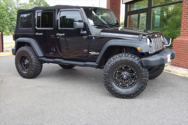 used 2014 Jeep Wrangler Unlimited car, priced at $19,988